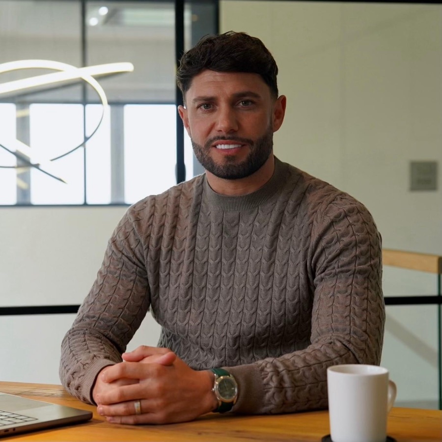 Dee Ludlow, founder of 5D Program, at his desk